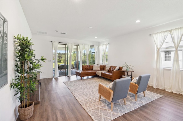 3224 Oxbow Ct, Harmony, FL 34773 - living area featuring wood finished floors, recessed lighting, and baseboards