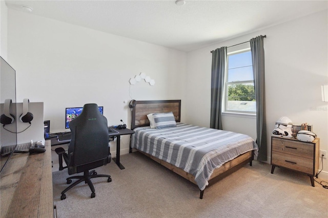 3224 Oxbow Ct, Harmony, FL 34773 - bedroom with light carpet, an office area, and baseboards