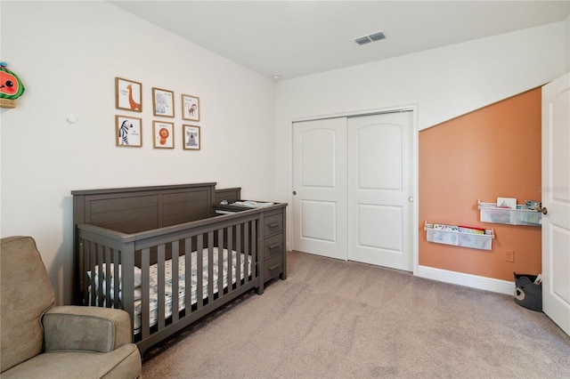 3224 Oxbow Ct, Harmony, FL 34773 - carpeted bedroom with a closet, a crib, and baseboards