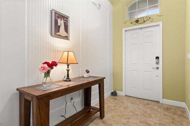 3606 Solana Cir, Clermont, FL 34711 - entrance foyer featuring baseboards and light tile patterned flooring