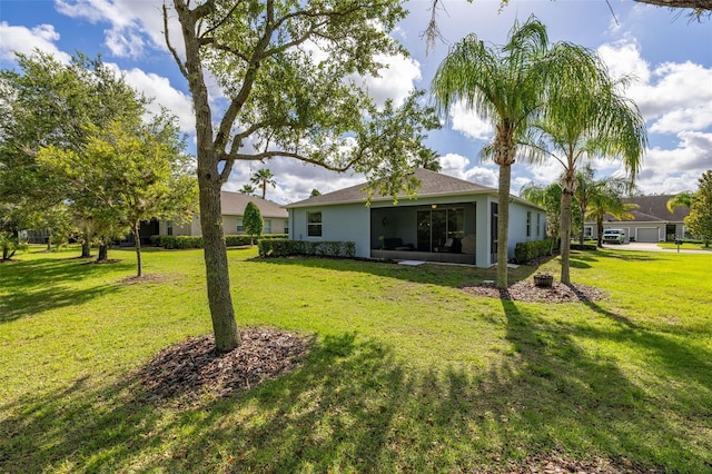 3606 Solana Cir, Clermont, FL 34711 - view of green lawn featuring a sunroom