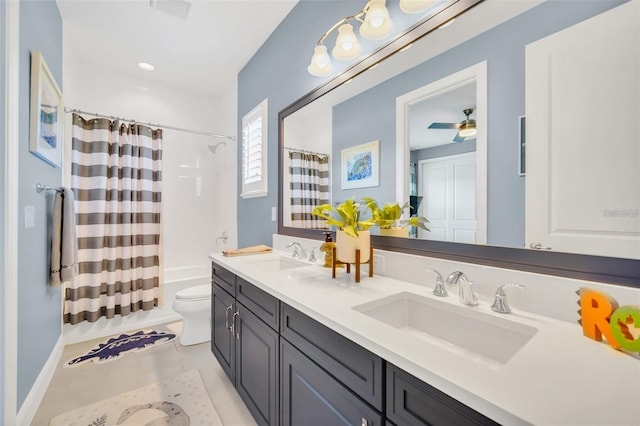 10836 Royal Cypress Way, Orlando, FL 32836 - full bath with double vanity, toilet, shower / tub combo, and a ceiling fan