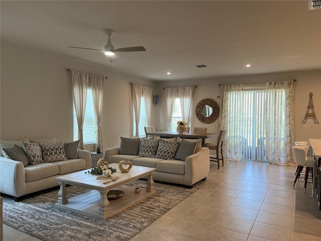 1896 Basenji Dr, Lake Alfred, FL 33850 - living area with healthy amount of natural light, a ceiling fan, light tile patterned flooring, and recessed lighting