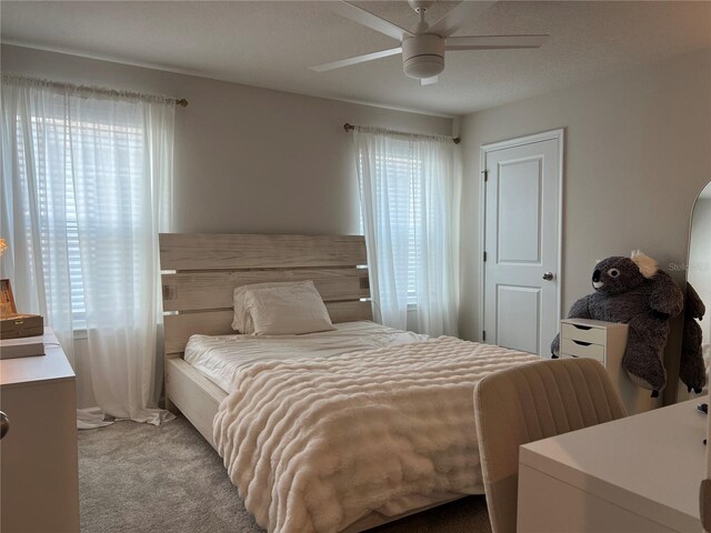 1896 Basenji Dr, Lake Alfred, FL 33850 - bedroom with carpet floors and a ceiling fan