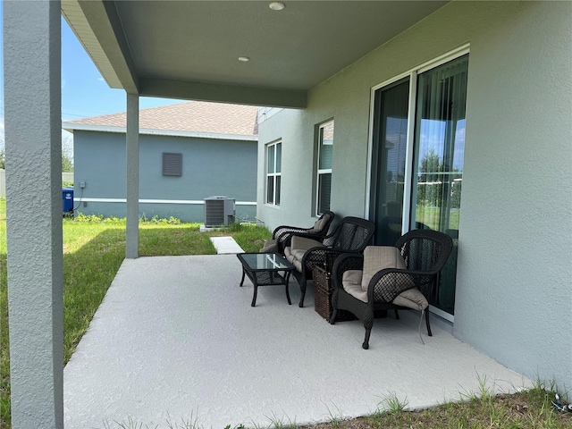 1896 Basenji Dr, Lake Alfred, FL 33850 - view of patio featuring cooling unit
