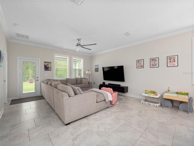 3052 Prelude Ln, Kissimmee, FL 34746 - living area featuring ornamental molding, ceiling fan, baseboards, and light tile patterned flooring