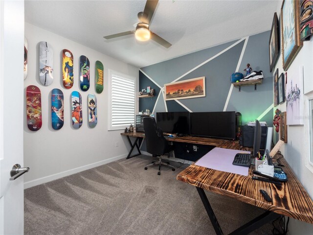3052 Prelude Ln, Kissimmee, FL 34746 - carpeted home office with a ceiling fan and baseboards
