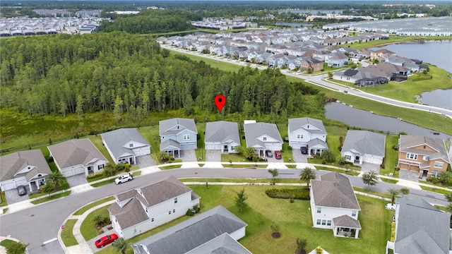 3052 Prelude Ln, Kissimmee, FL 34746 - aerial perspective of suburban area featuring a large body of water