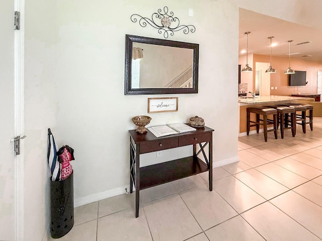 1876 Summer Dr, Davenport, FL 33897 - corridor featuring light tile patterned flooring and baseboards