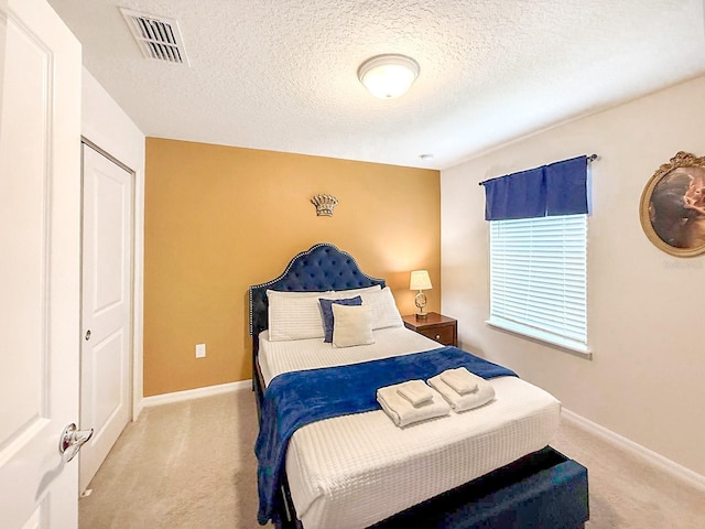 1876 Summer Dr, Davenport, FL 33897 - bedroom featuring carpet flooring, baseboards, and a textured ceiling