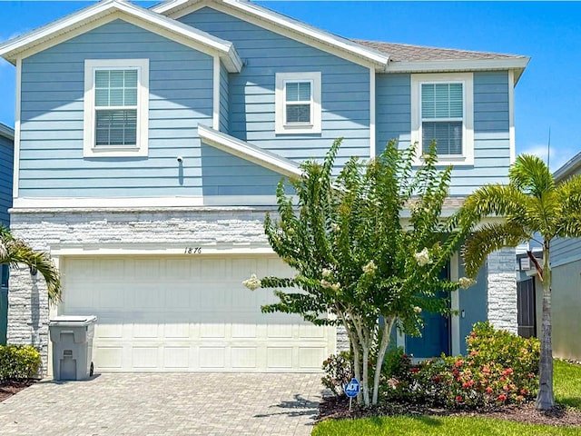 1876 Summer Dr, Davenport, FL 33897 - view of front of property with driveway and a garage