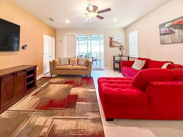 1876 Summer Dr, Davenport, FL 33897 - living room with a ceiling fan and baseboards