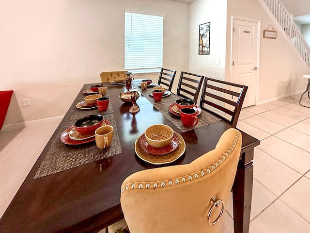 1876 Summer Dr, Davenport, FL 33897 - dining space with tile patterned floors, baseboards, and stairs