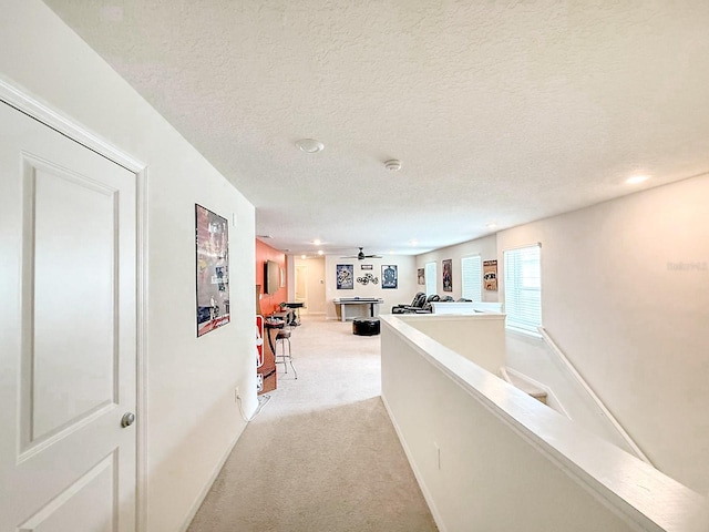 1876 Summer Dr, Davenport, FL 33897 - hall featuring light colored carpet, a textured ceiling, and recessed lighting