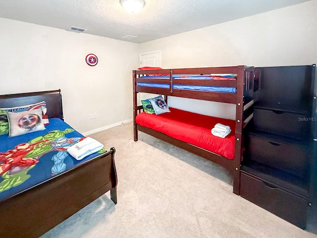 1876 Summer Dr, Davenport, FL 33897 - bedroom featuring carpet, a textured ceiling, and baseboards