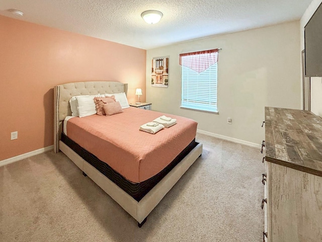 1876 Summer Dr, Davenport, FL 33897 - bedroom with carpet floors, a textured ceiling, and baseboards