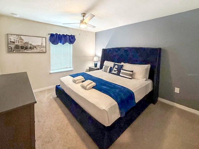 1876 Summer Dr, Davenport, FL 33897 - carpeted bedroom with baseboards and ceiling fan
