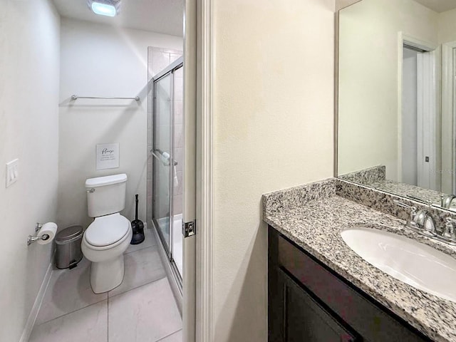 1876 Summer Dr, Davenport, FL 33897 - bathroom with toilet, vanity, a shower stall, and tile patterned floors