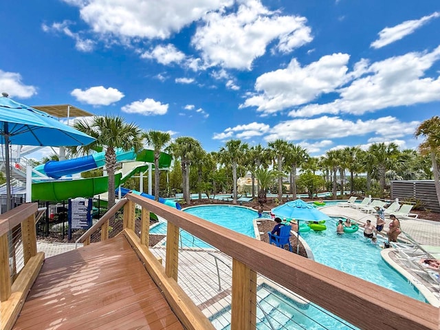 1876 Summer Dr, Davenport, FL 33897 - community pool featuring a wooden deck