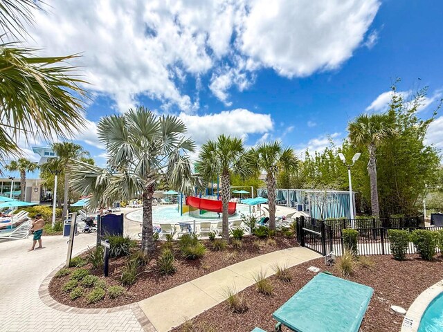 1876 Summer Dr, Davenport, FL 33897 - view of property's community with a swimming pool