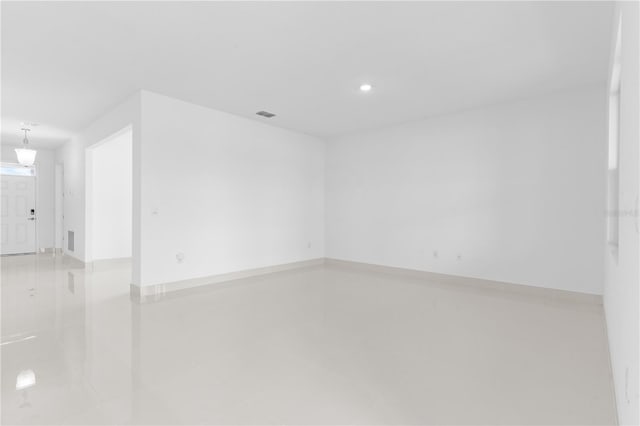17795 Blazing Star Cir, Clermont, FL 34714 - empty room featuring baseboards and recessed lighting