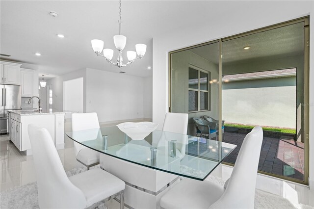 17795 Blazing Star Cir, Clermont, FL 34714 - dining area with a chandelier and recessed lighting