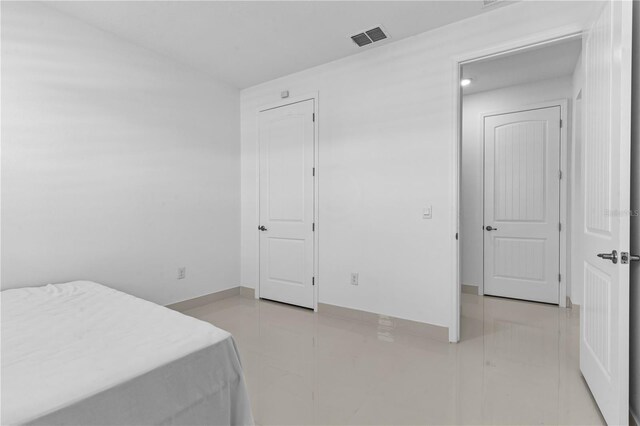 17795 Blazing Star Cir, Clermont, FL 34714 - bedroom with baseboards
