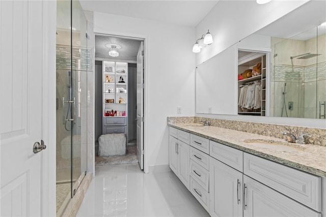 17795 Blazing Star Cir, Clermont, FL 34714 - full bath featuring a spacious closet, double vanity, a stall shower, and tile patterned floors