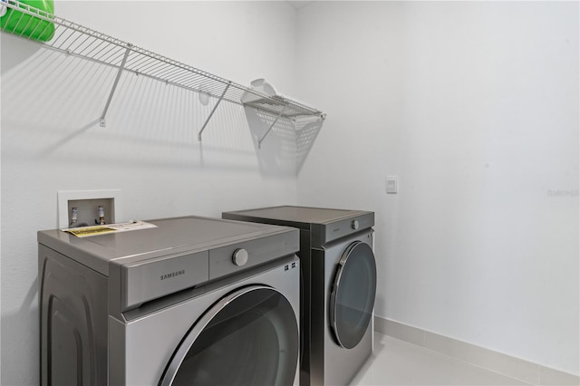17795 Blazing Star Cir, Clermont, FL 34714 - washroom with washer and clothes dryer