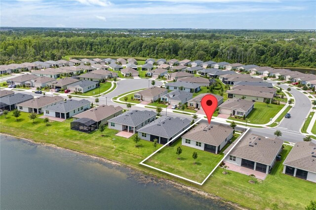 17795 Blazing Star Cir, Clermont, FL 34714 - aerial view of residential area with a large body of water