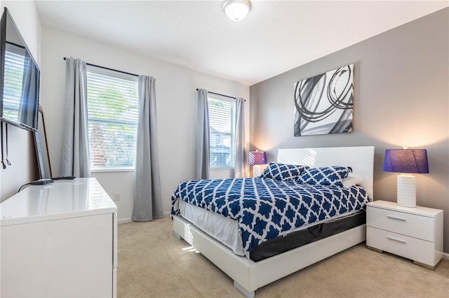 2623 Calistoga Ave, Kissimmee, FL 34741 - bedroom featuring light carpet and baseboards