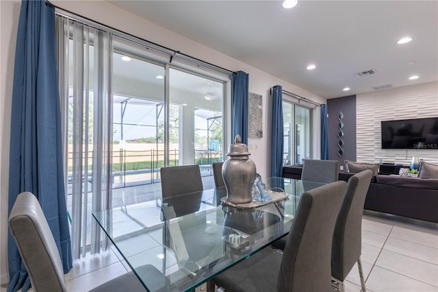 2623 Calistoga Ave, Kissimmee, FL 34741 - dining room featuring light tile patterned floors and recessed lighting