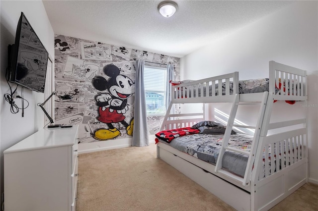 2623 Calistoga Ave, Kissimmee, FL 34741 - carpeted bedroom featuring a textured ceiling and baseboards