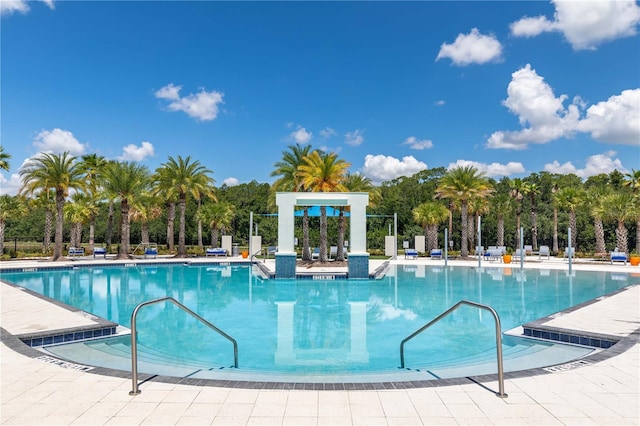 2623 Calistoga Ave, Kissimmee, FL 34741 - community pool with view of scattered trees