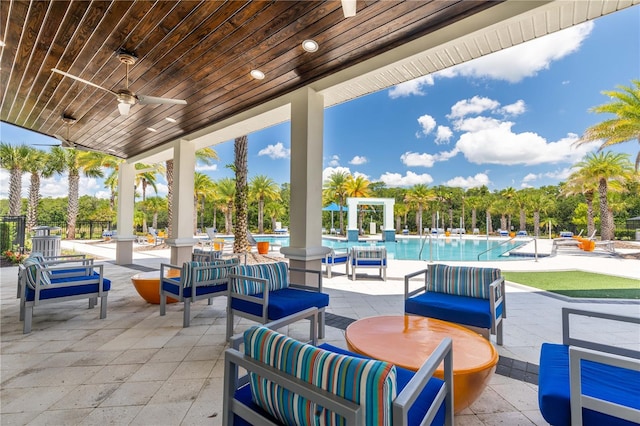 2623 Calistoga Ave, Kissimmee, FL 34741 - view of patio / terrace with a community pool, a ceiling fan, and an outdoor living space