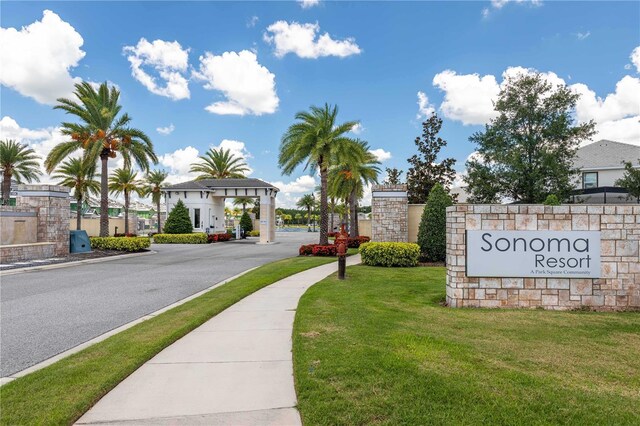 2623 Calistoga Ave, Kissimmee, FL 34741 - community / neighborhood sign featuring a lawn