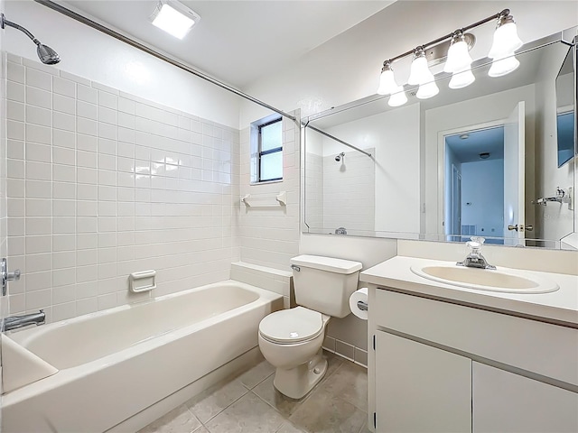 5452 Higgins Way, Orlando, FL 32808 - bathroom featuring toilet, bathtub / shower combination, vanity, and tile patterned flooring