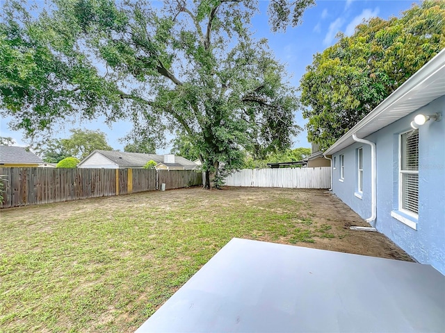 5452 Higgins Way, Orlando, FL 32808 - view of yard with a patio area