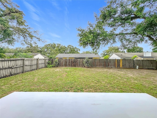 5452 Higgins Way, Orlando, FL 32808 - view of yard with a patio area