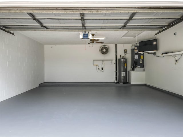 5452 Higgins Way, Orlando, FL 32808 - garage with water heater, concrete block wall, heating unit, and a garage door opener