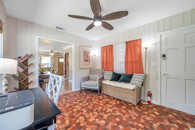 2601 Upton St S, Gulfport, FL 33711 - living area featuring ceiling fan and baseboards