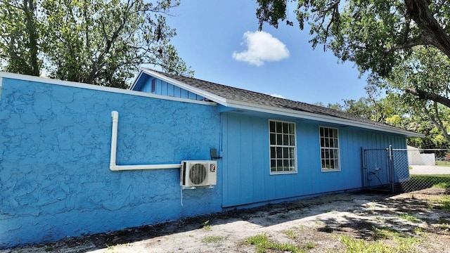 4546 Ontario Dr, New Port Richey, FL 34652 - view of side of property featuring a cooling unit