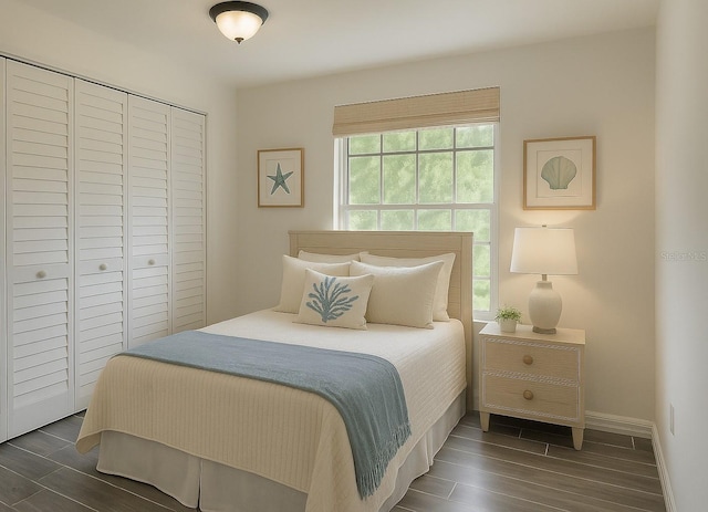 4546 Ontario Dr, New Port Richey, FL 34652 - bedroom featuring wood finish floors, a closet, and baseboards