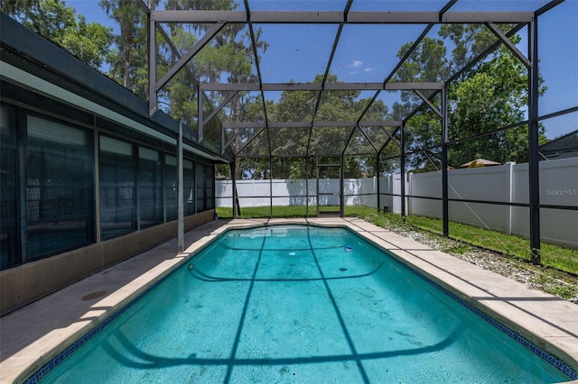 4307 Oak Ct, Saint Cloud, FL 34769 - view of swimming pool with a fenced backyard, glass enclosure, and a patio area