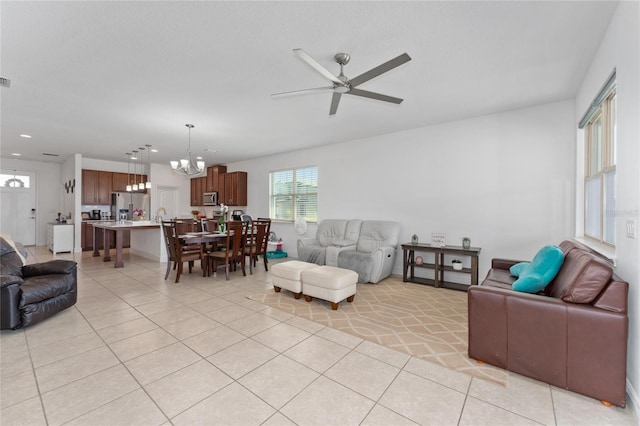 6651 Syreeta Ln, Harmony, FL 34773 - living area featuring a chandelier, a ceiling fan, light tile patterned floors, and recessed lighting