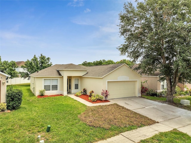 3274 Hunters Chase Loop, Kissimmee, FL 34743 - view of front of house featuring a garage, concrete driveway, a shingled roof, stucco siding, and a front yard