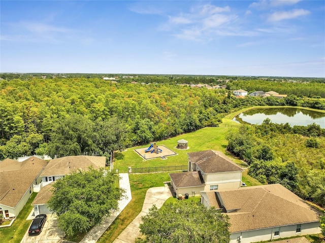 3274 Hunters Chase Loop, Kissimmee, FL 34743 - drone / aerial view of a heavily wooded area and a nearby body of water