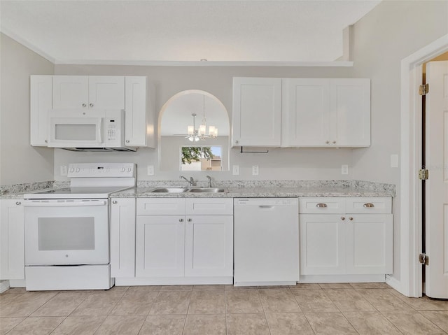 3274 Hunters Chase Loop, Kissimmee, FL 34743 - kitchen with white appliances, a sink, and white cabinetry