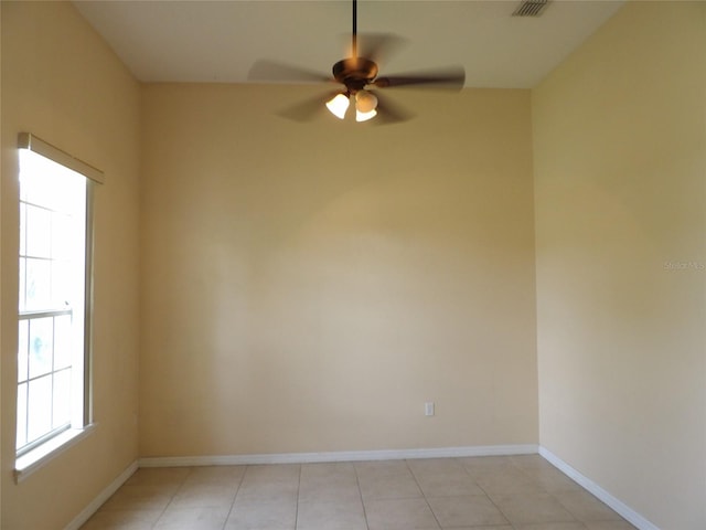 3074 Bay Laurel Cir N, Kissimmee, FL 34744 - unfurnished room featuring a ceiling fan, baseboards, and light tile patterned floors