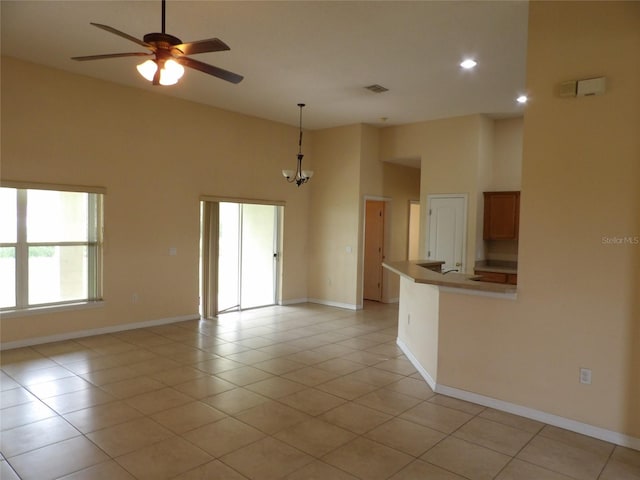 3074 Bay Laurel Cir N, Kissimmee, FL 34744 - empty room with a ceiling fan, light tile patterned floors, baseboards, recessed lighting, and lofted ceiling